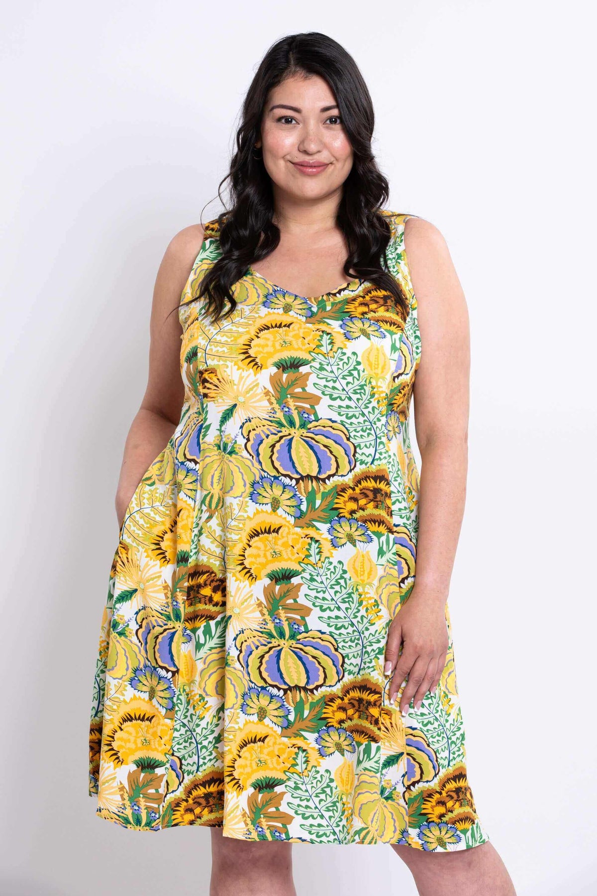 Close-up of yellow floral summer dress highlighting sweetheart neckline and print