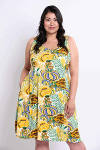 Close-up of yellow floral summer dress highlighting sweetheart neckline and print