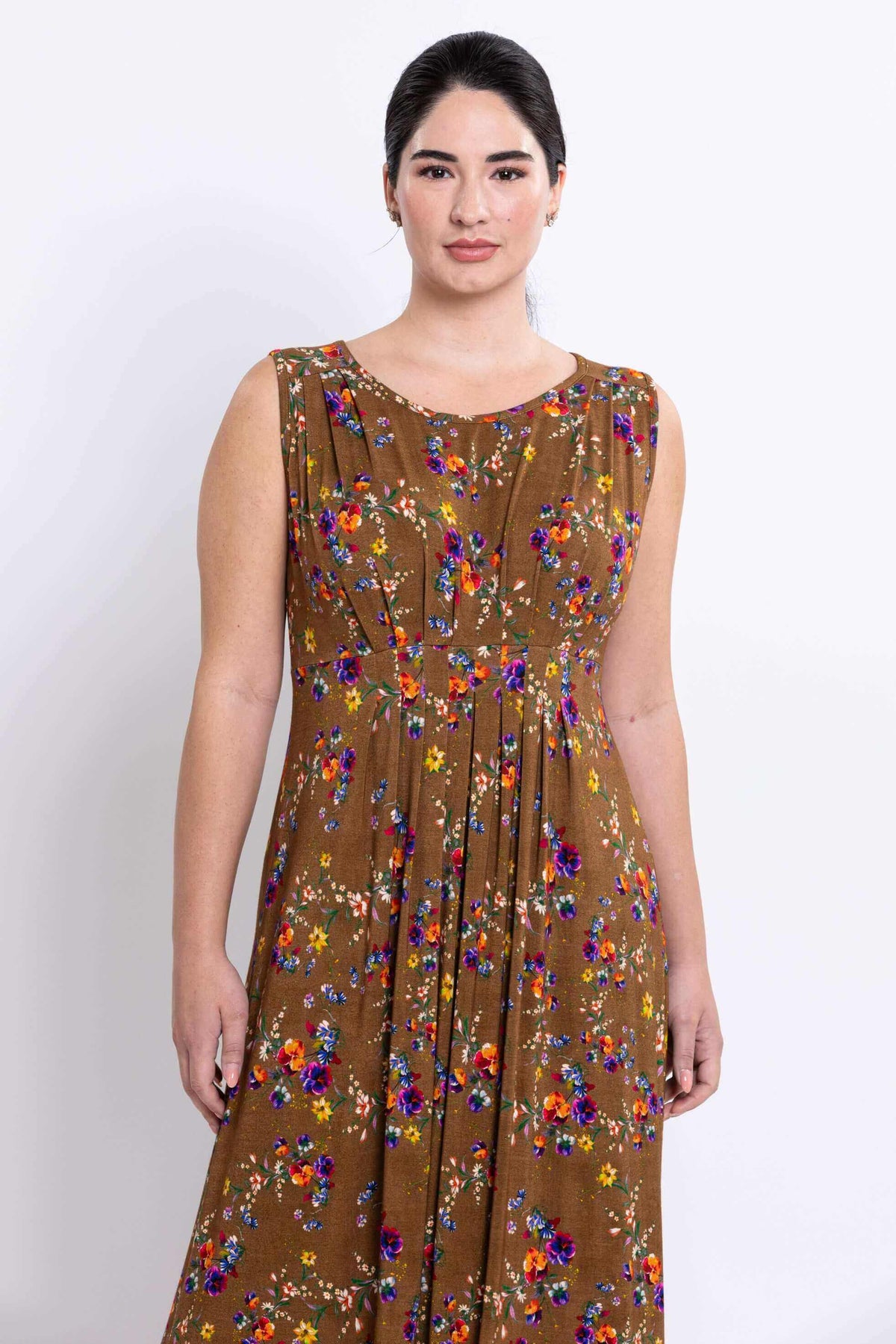 Close-up of the upper bodice and neckline on the brown floral sleeveless maxi dress