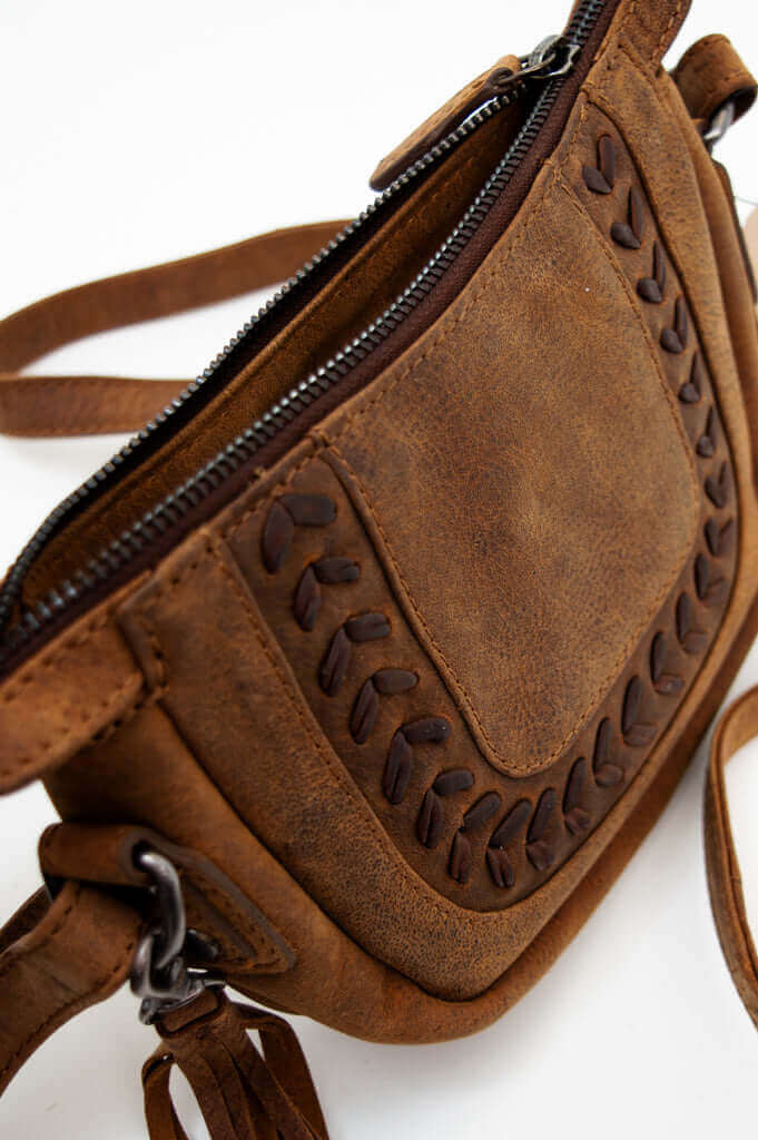 Close-up of detailed stitching and texture on Terra Rustic Crossbody Bag