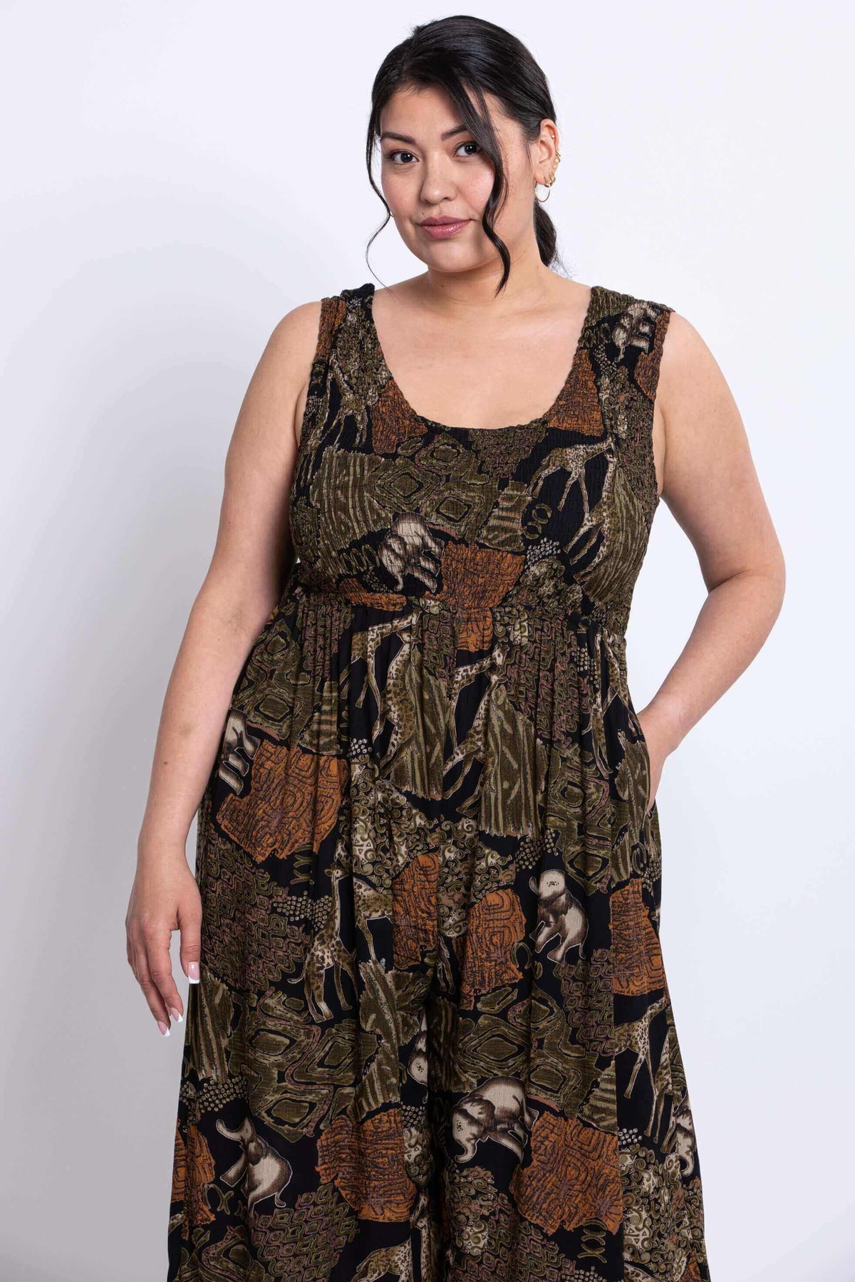 Close-up upper body of model in safari print elastic bodice jumpsuit