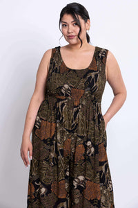 Close-up upper body of model in safari print elastic bodice jumpsuit