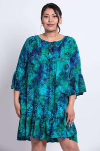 Close-up front view of Wanda dress showing tie neckline and sleeve details