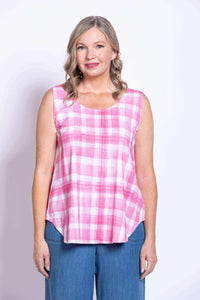 Close up of woman in pink plaid sleeveless tank top smiling