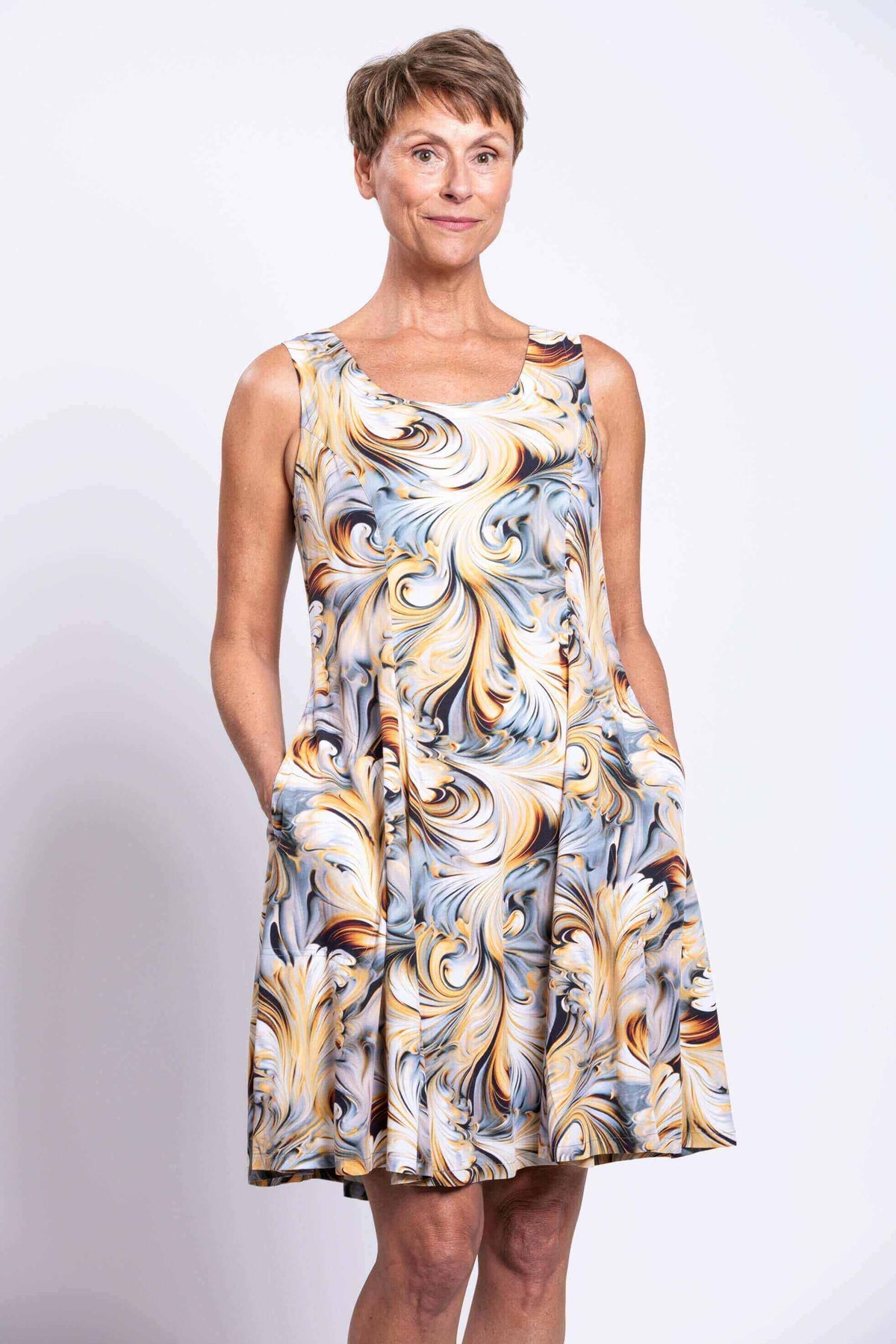 Close up of swirl print sleeveless dress with pockets