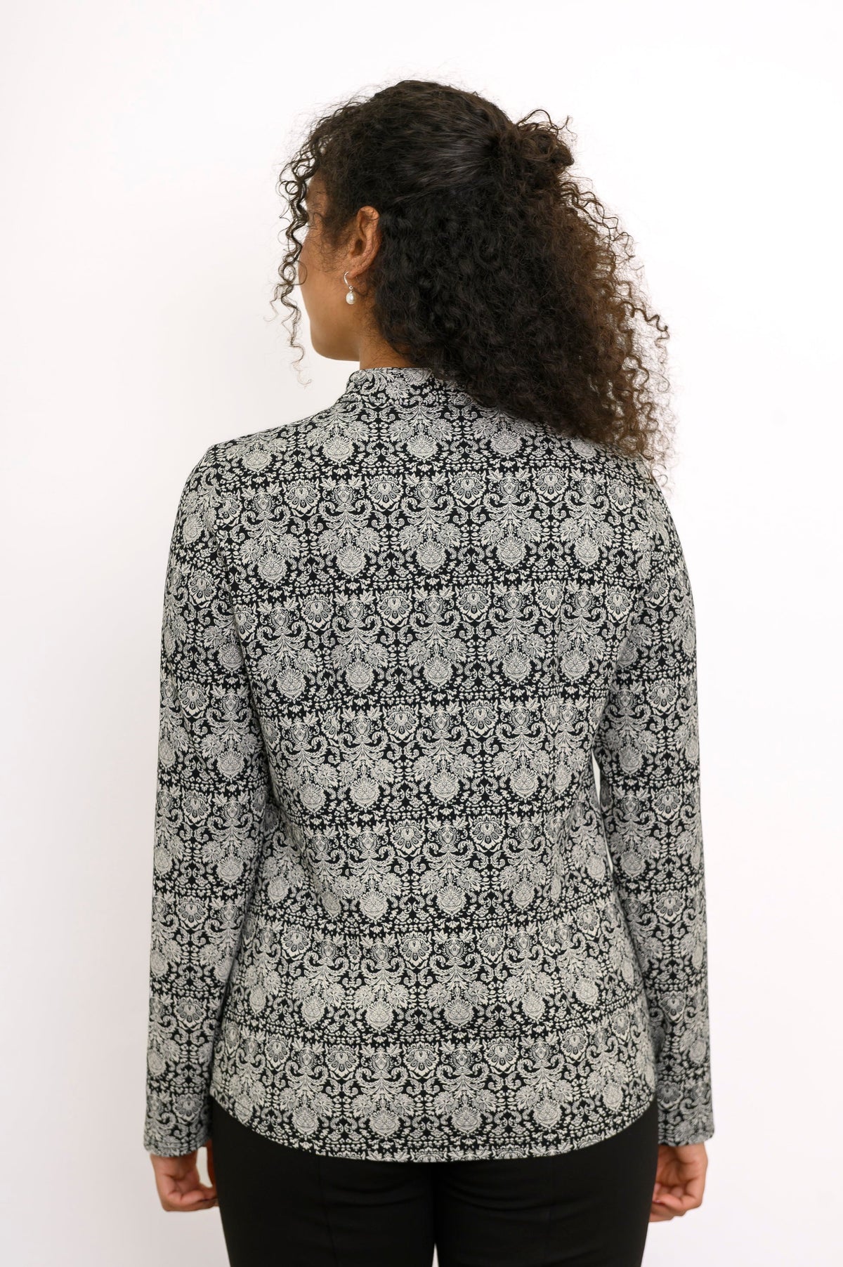 Back view of a grey floral bamboo shirt showing the clean paneled structure across the shoulders and waist
