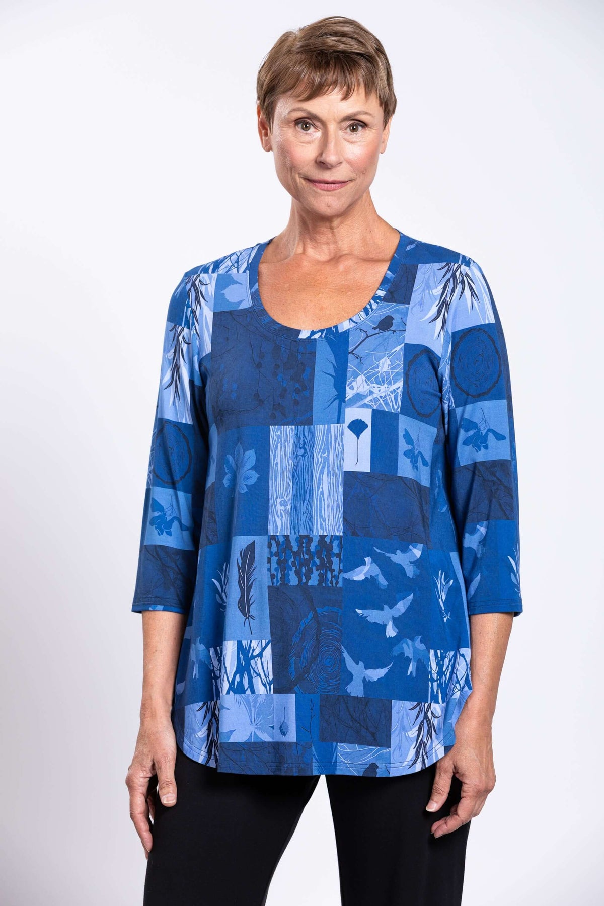 Detail shot of blue mosaic bamboo top with scoop neckline