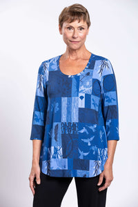 Detail shot of blue mosaic bamboo top with scoop neckline
