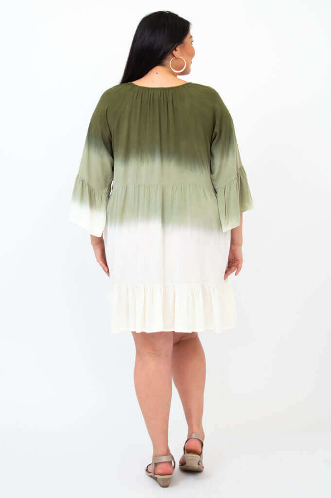 Back view of model displaying ombre effect and flowy 3/4 sleeves of Ellie Dress