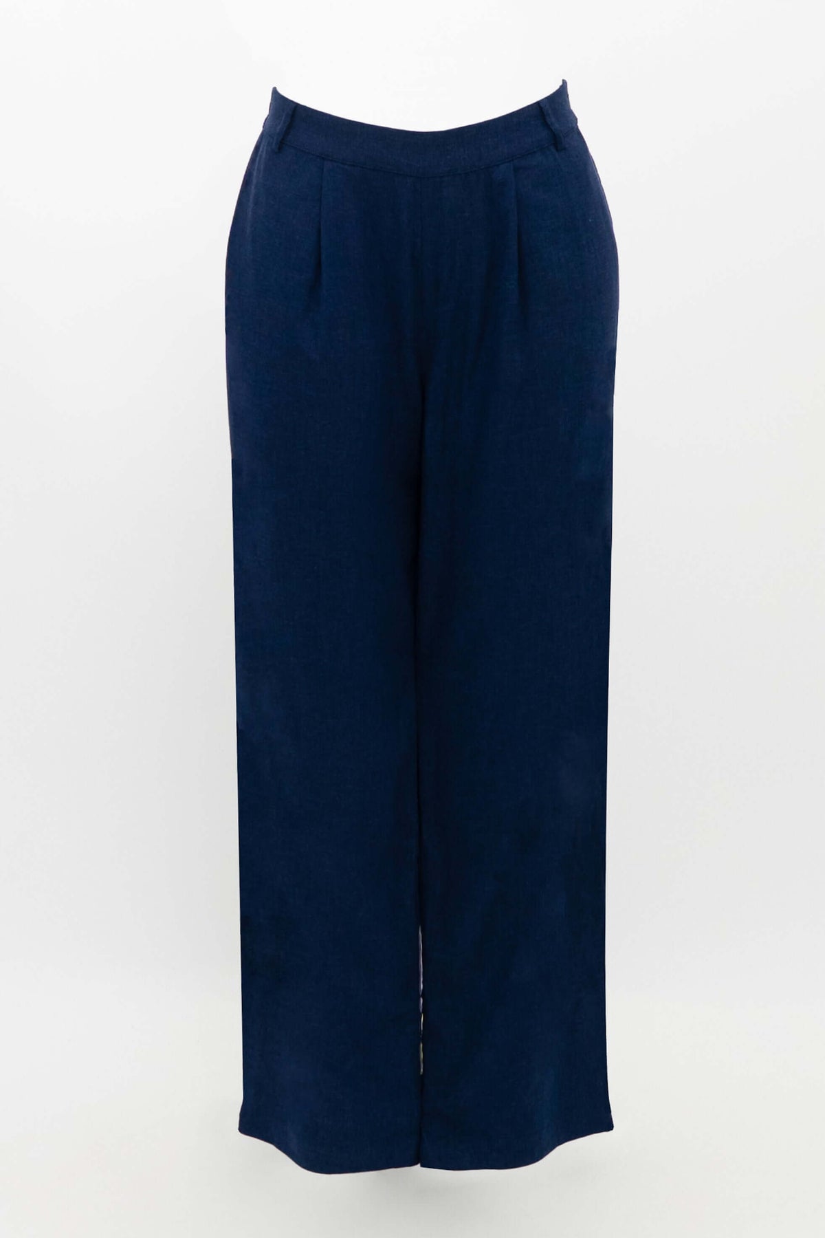 Flat lay of navy Melodie pants against a white background