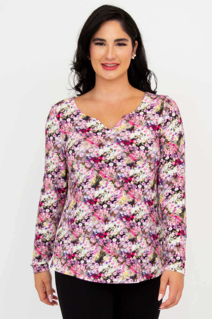Front view of woman wearing floral sweetheart neckline long sleeve bamboo top