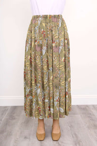 Close-up front view of a floral tiered maxi skirt with elastic waistband