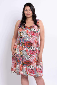 Front close-up of woman in floral A-line summer dress