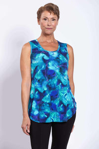 Front close-up of woman wearing sleeveless blue patterned Jazz Tank