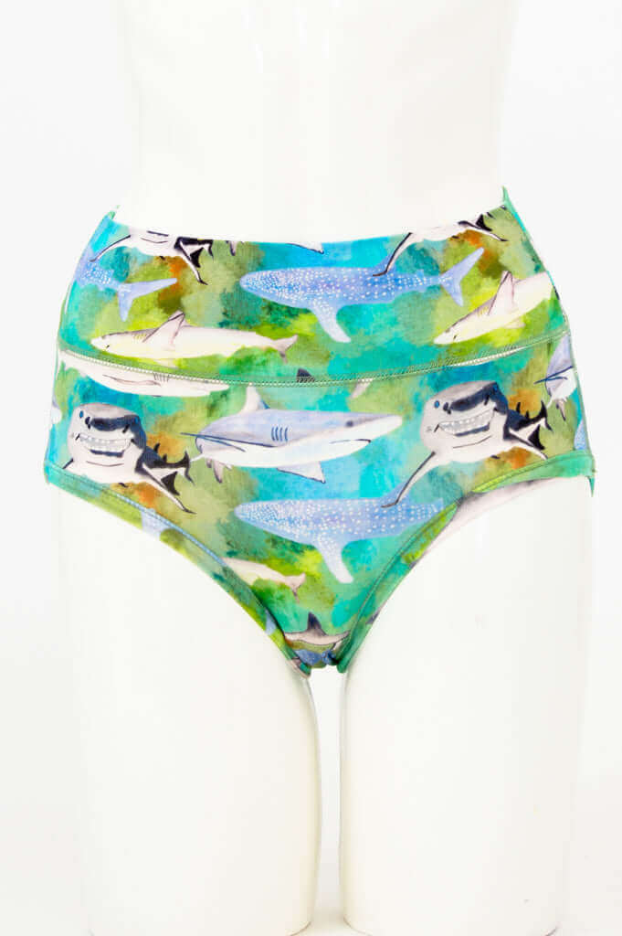 Front view of high-waisted women's brief with colorful shark print