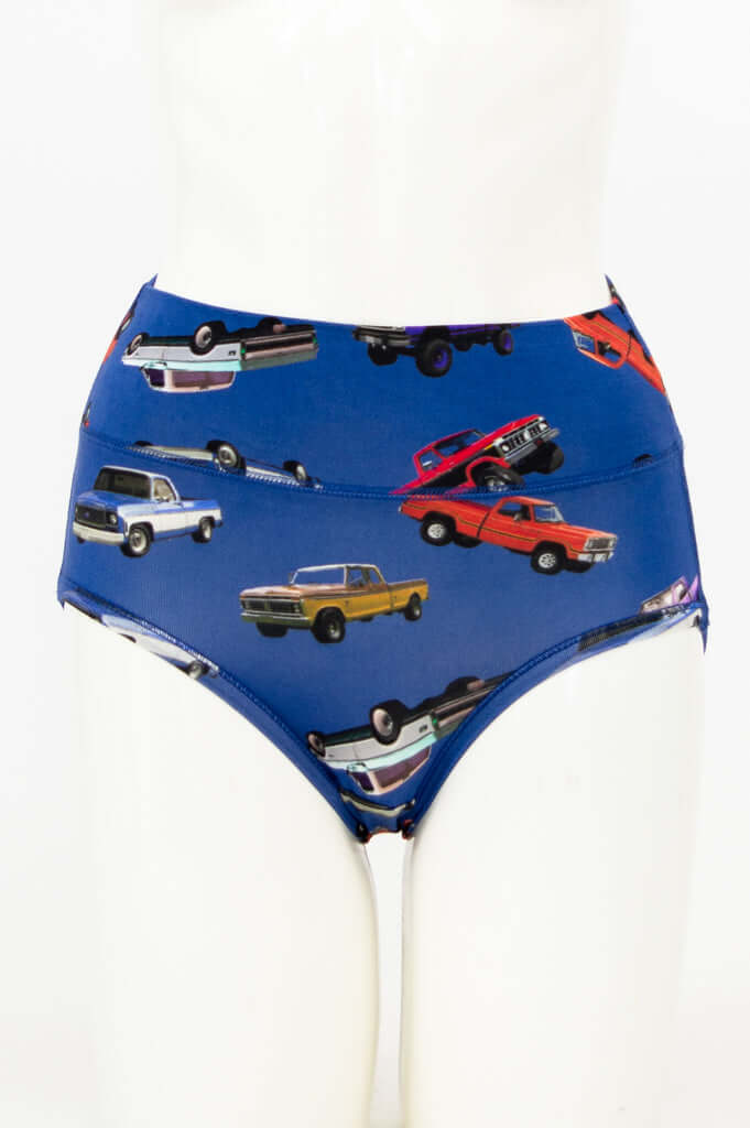 Front view of high-waisted women's brief with colorful retro trucks print