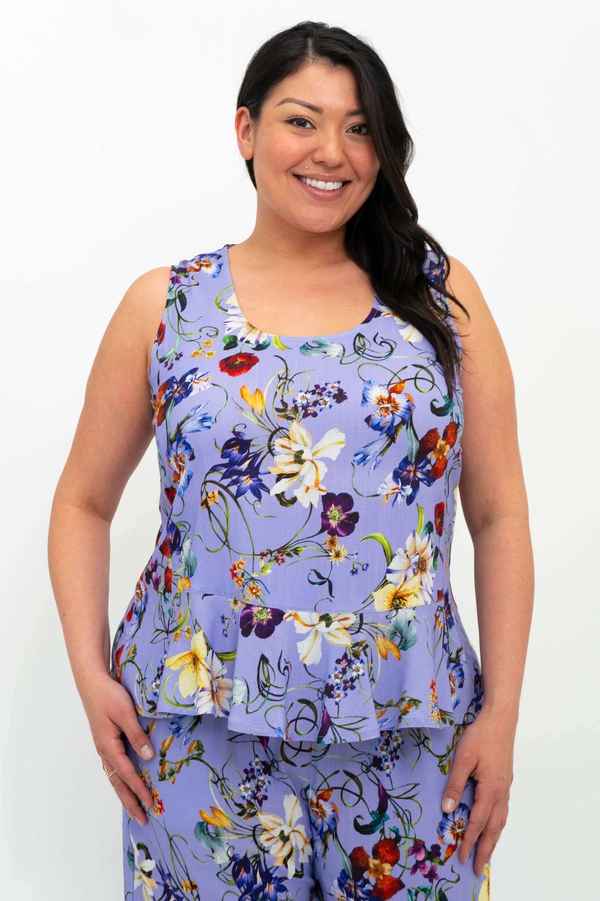 Front view of model wearing Ginny Tank in lavender floral print