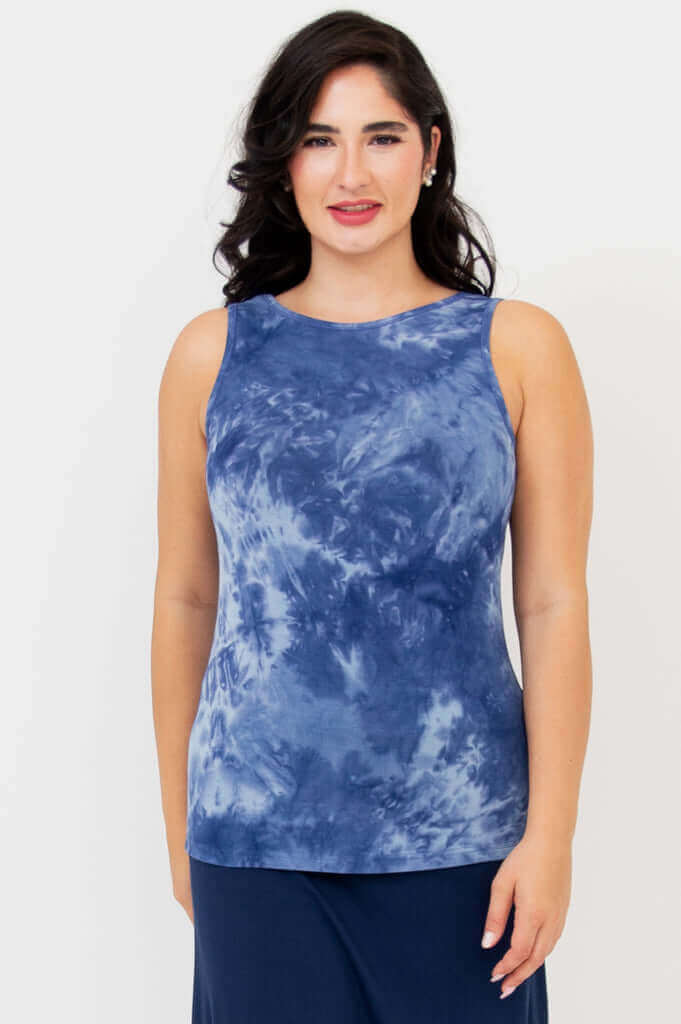 Front view of model wearing indigo tie dye reversible bamboo tank with round neck