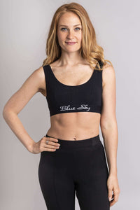 Front view of woman wearing Blue Sky black comfort bra and matching pants