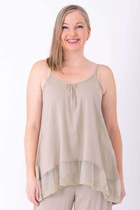 Front view of model wearing beige Chantilly Lace Tank with lace hem