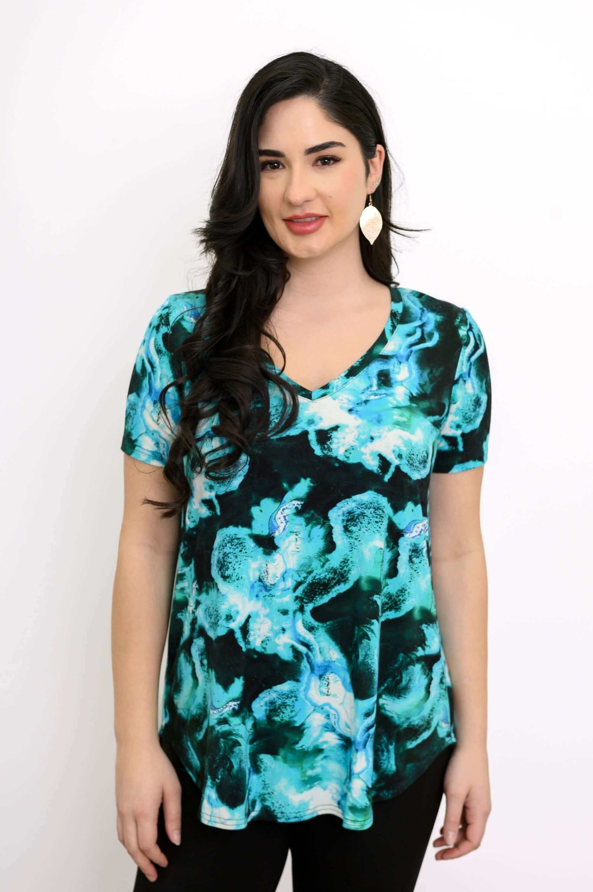 Front view of woman wearing Jackie bamboo V-neck top in Lagoon print