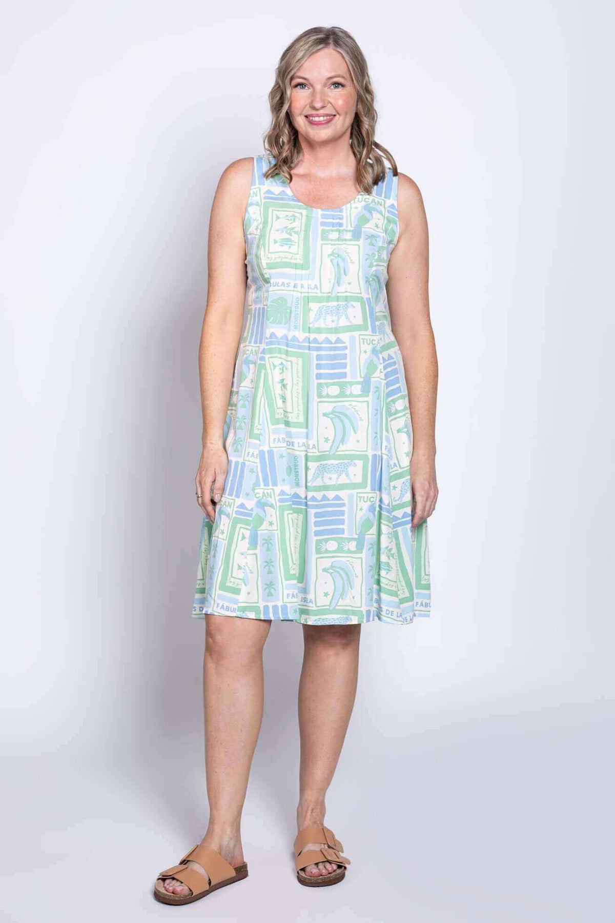 Front view of model wearing sleeveless pastel print Arden dress