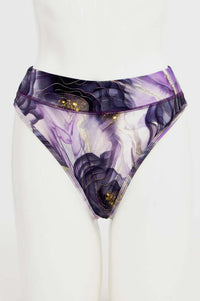 Front view of high-rise thong underwear in purple and gold abstract print on mannequin