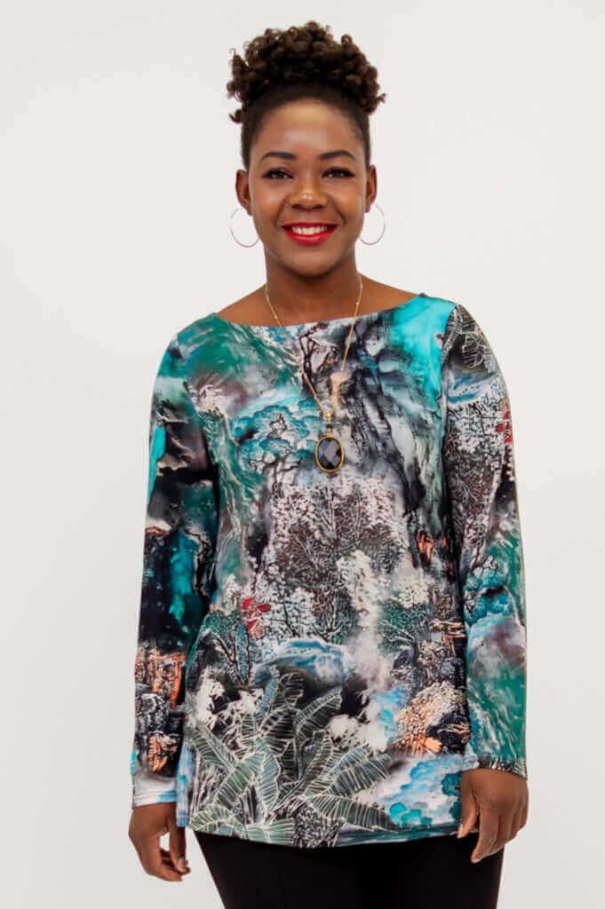 Front view of model wearing long sleeve artistic print bamboo boatneck top
