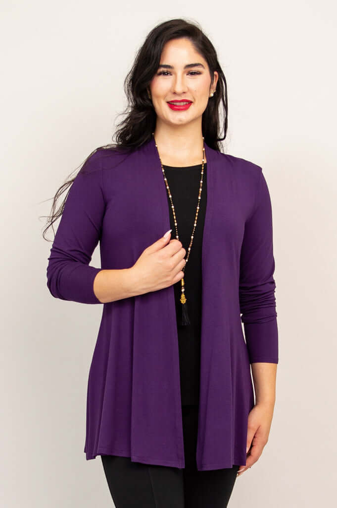 Front view of a woman wearing a violet long sleeve open-front bamboo jacket