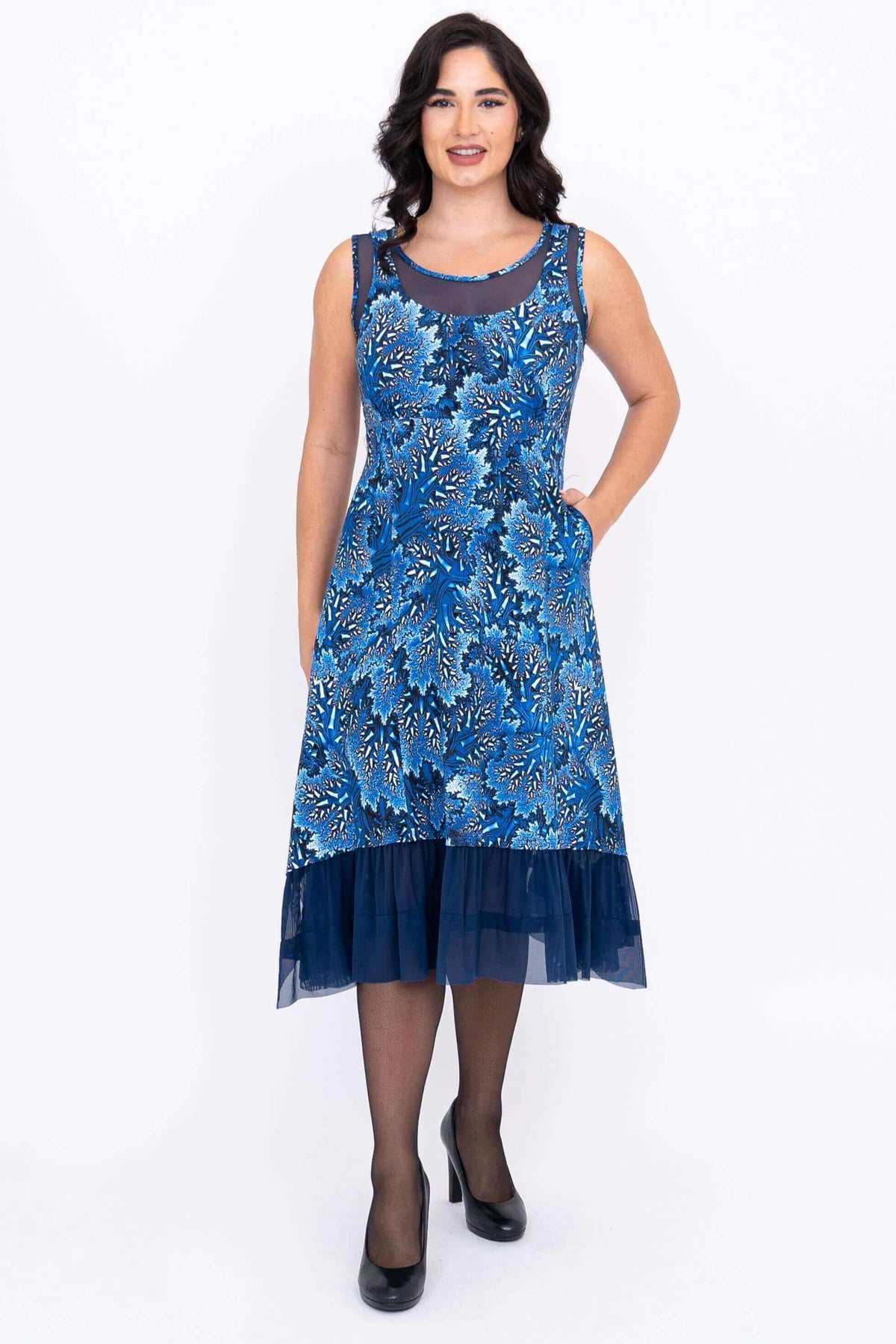 Front view of blue floral Danube dress with mesh hem and sleeveless design