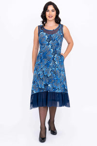Front view of blue floral Danube dress with mesh hem and sleeveless design