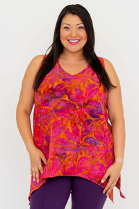 Front view of a model wearing a vibrant orange and pink sleeveless V-neck tank top