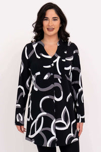 Front view of woman wearing the Edwina black and white abstract print bamboo tunic