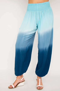 Front view of Embra ombre blue boho pants with elastic waistband