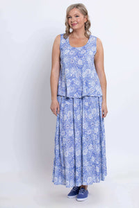 Woman standing in sleeveless periwinkle floral Ginny Tank and matching skirt, facing forward