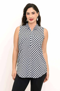 Front view of a woman wearing a black and white gingham sleeveless tank top