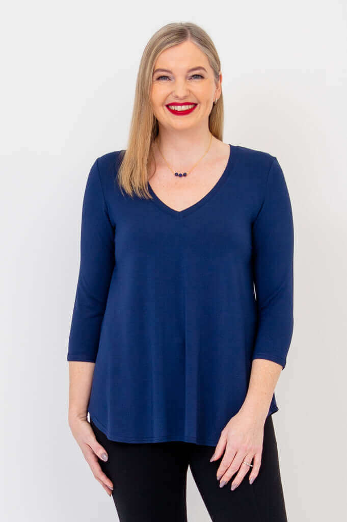 Front view of woman wearing Jackie V-neck bamboo top in navy