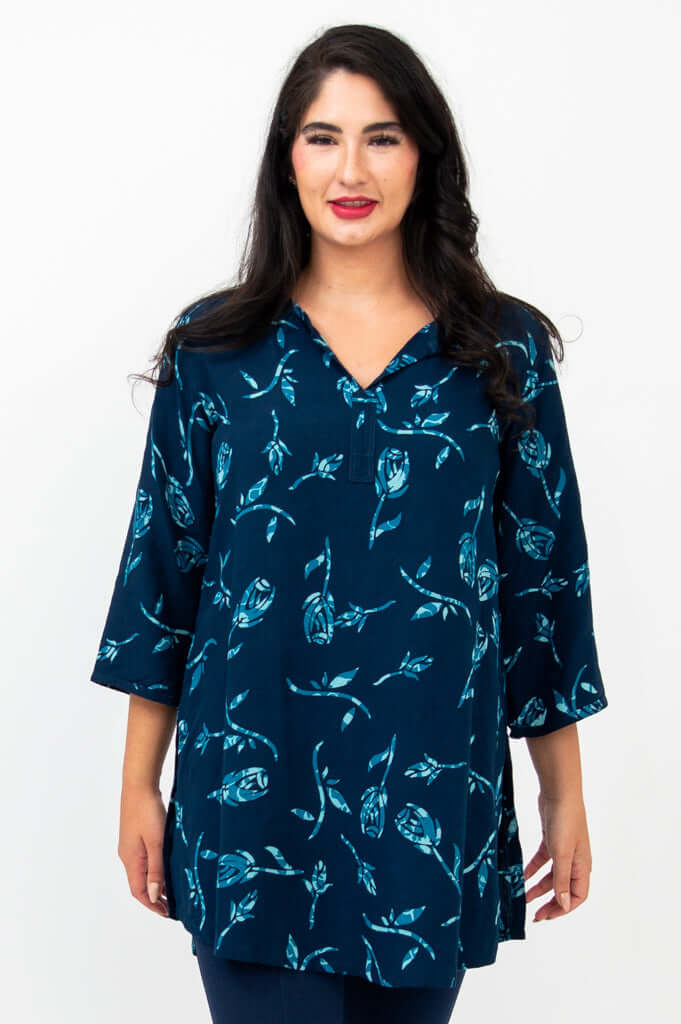 Front view of model wearing the Kary Tunic Top in Indigo Rose print