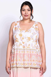 Front view of model wearing the Kaya Floral Tank Top with yellow and pink floral print