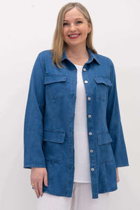 Front view of woman wearing blue Kelly jacket with flap pockets and button closure