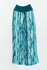 Front view of teal and blue patterned Landon Capri pants with wide waistband
