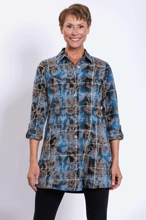 Front view of a woman wearing a blue plaid Larissa Flannel Tunic with rolled 3/4 sleeves