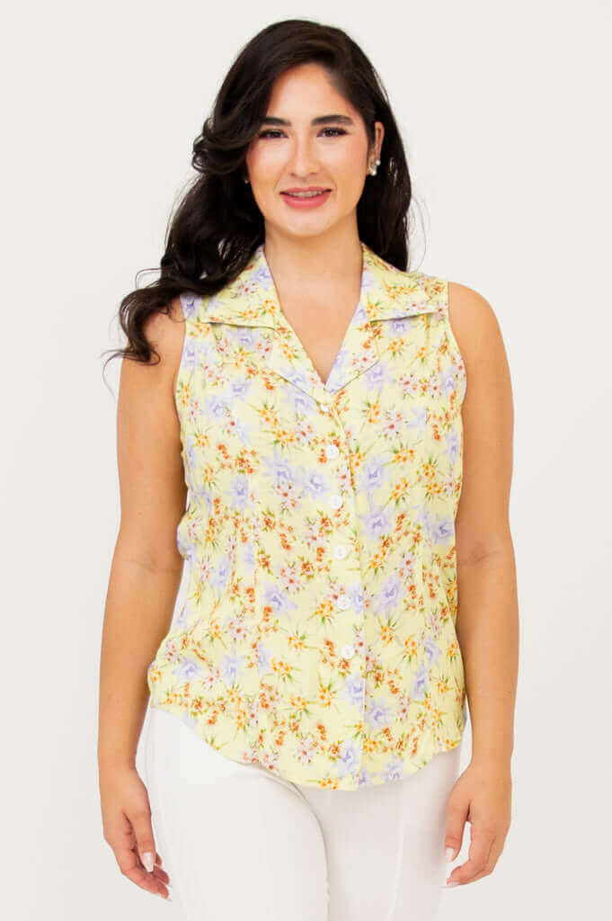 Front view of model wearing Lexa yellow floral sleeveless shirt