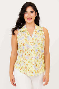 Front view of model wearing Lexa yellow floral sleeveless shirt