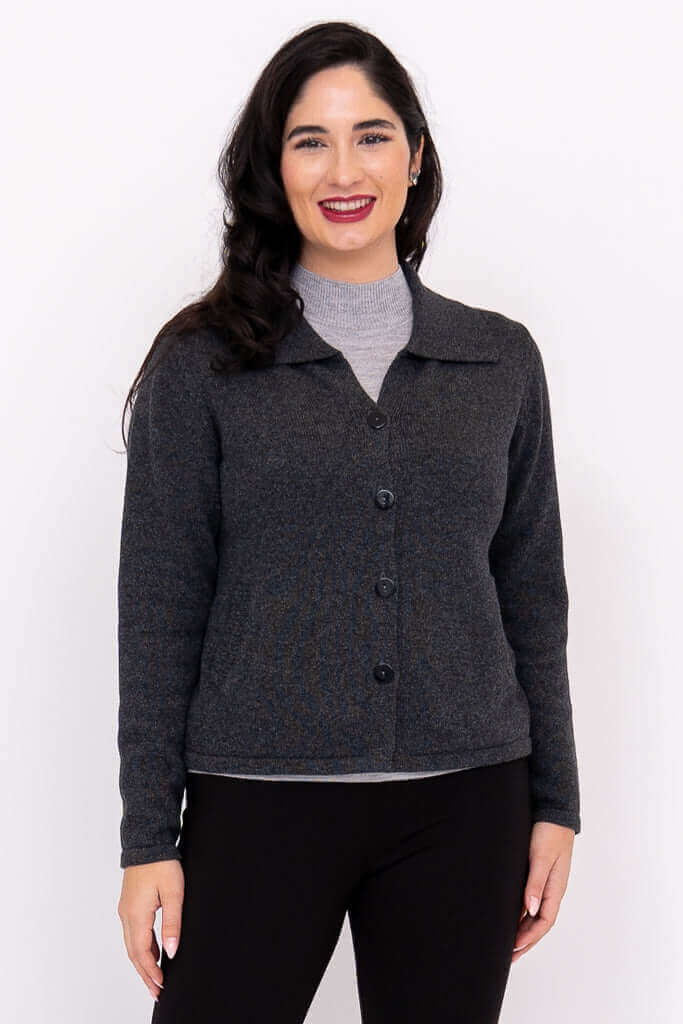 Model wearing a charcoal gray hip-length button-front cardigan with classic collar, front view