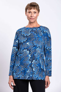 Front view of woman wearing blue botanical print long sleeve Margie top