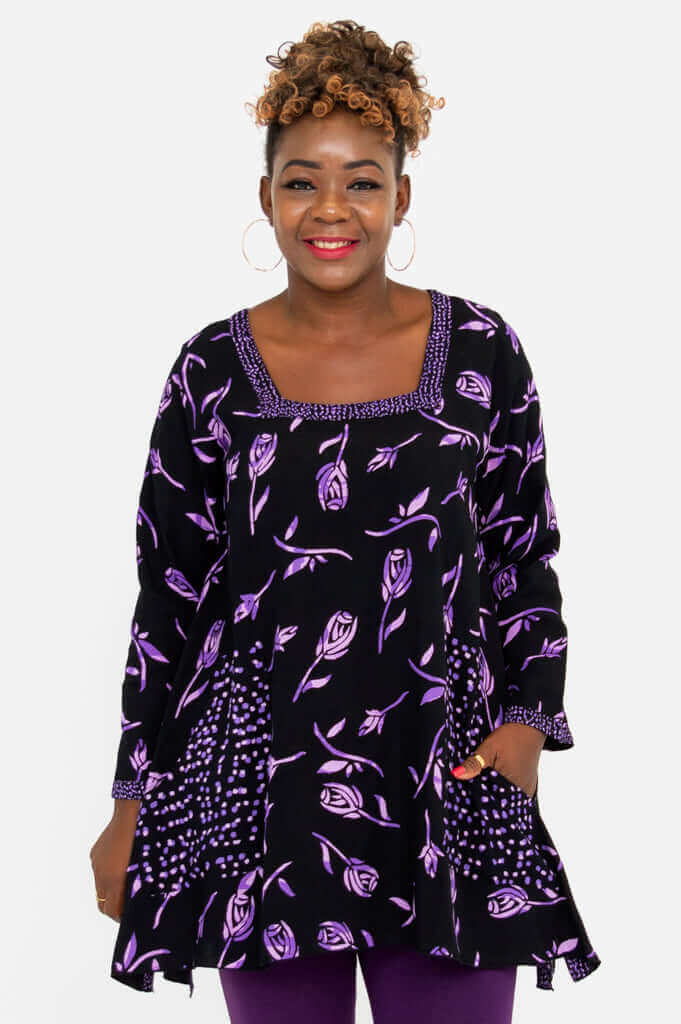 Front view of model wearing Maria Tunic with purple floral print