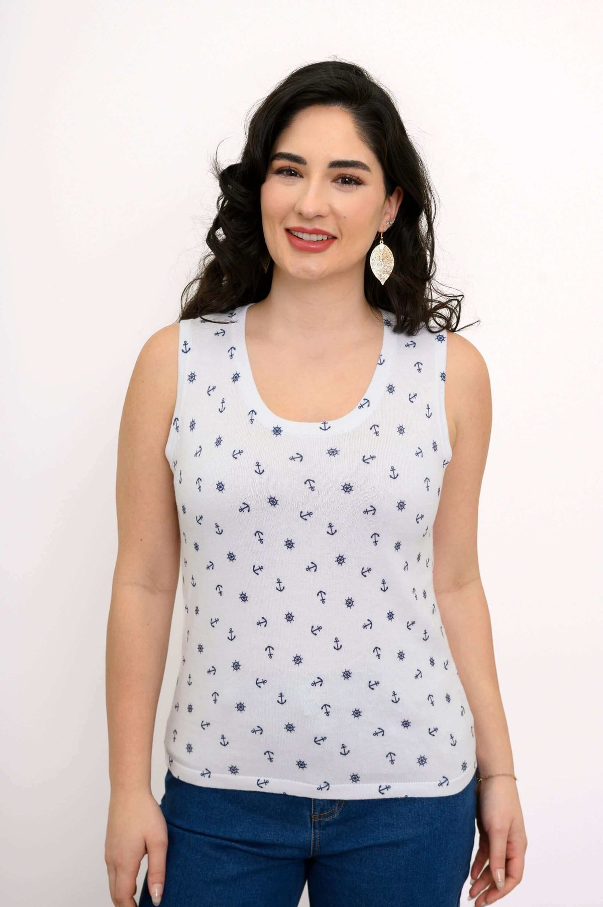Woman wearing a white nautical print tank top, front view