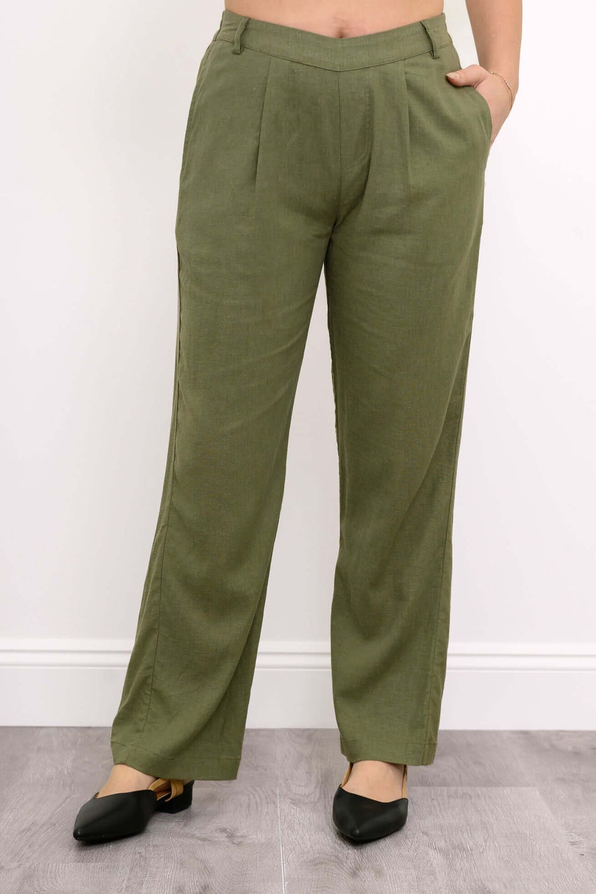Front view of olive green pull-on pants with pleated front and side pockets