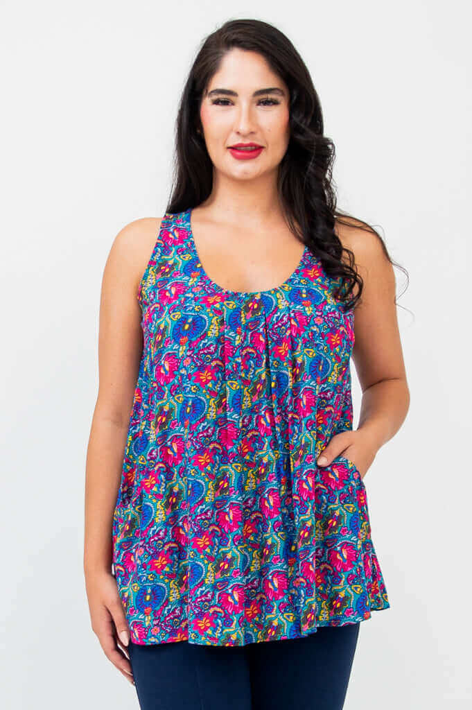 Front view of model wearing a bright paisley print sleeveless Peachy pleated tank top
